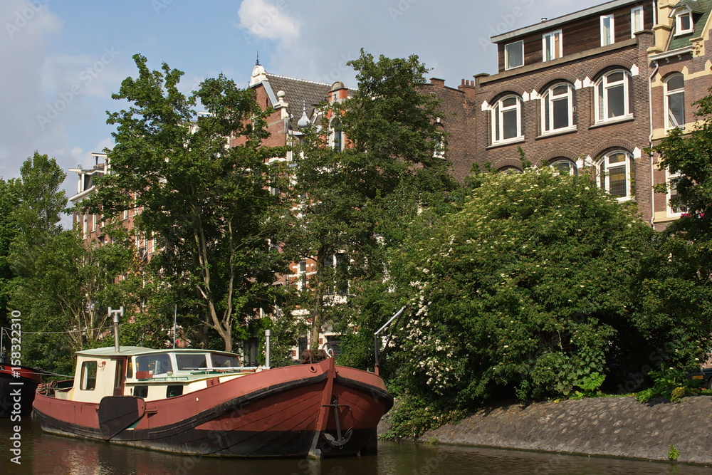Fototapeta premium Hausboote in Amsterdam