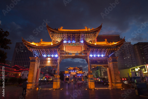 The gate of Yunnan Nationalities Village and many people are visiting at Kunming City, Yunnan Province, China.