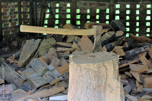 Fototapeta Naklejka Na Ścianę i Meble -  An Image of Wood chopping - axe