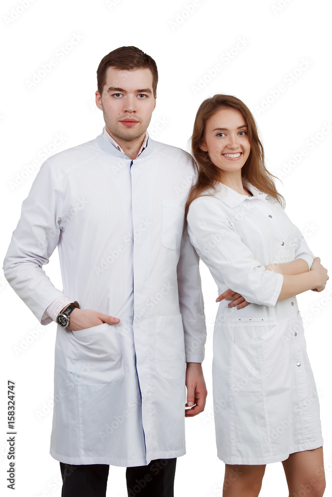 A pair of young doctors on a white isolated background. Interns A pair of young doctors on a white isolated background. Interns