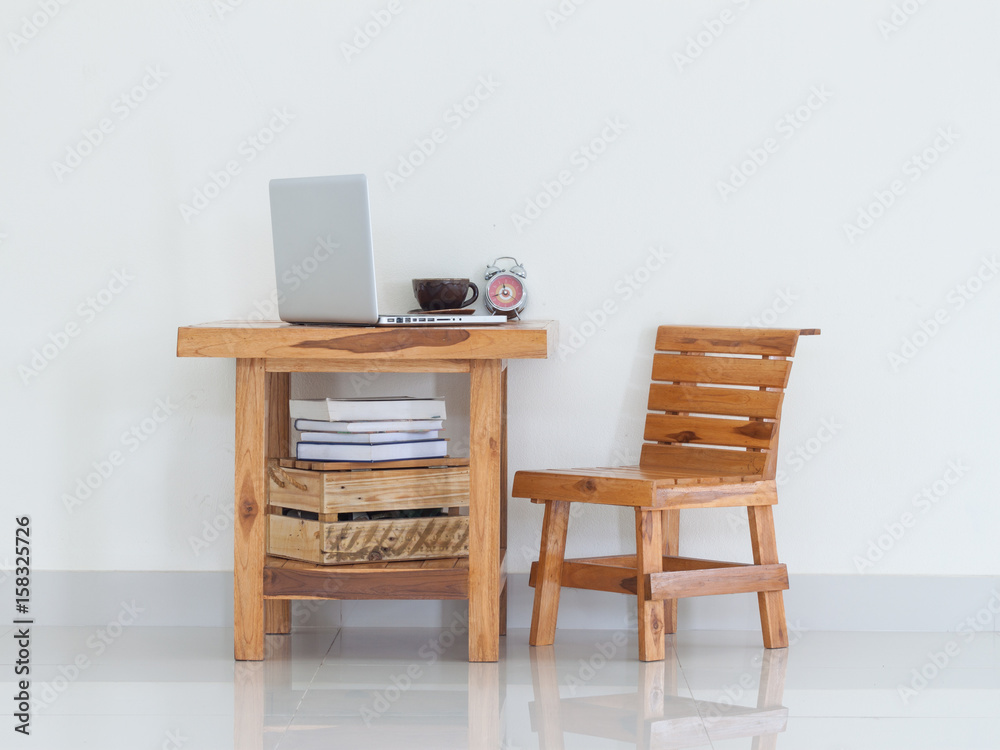 Working table with laptop and coffee cup, interior design Working table with laptop and coffee cup, interior design