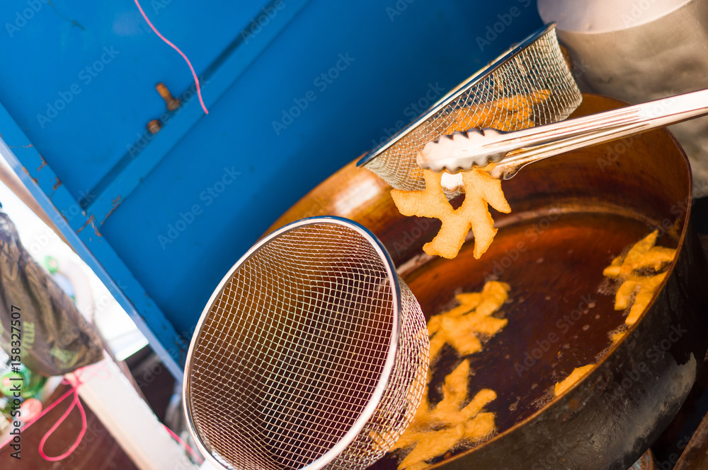 Fototapeta premium Homemade fried pristinos with sugar and its ingredients
