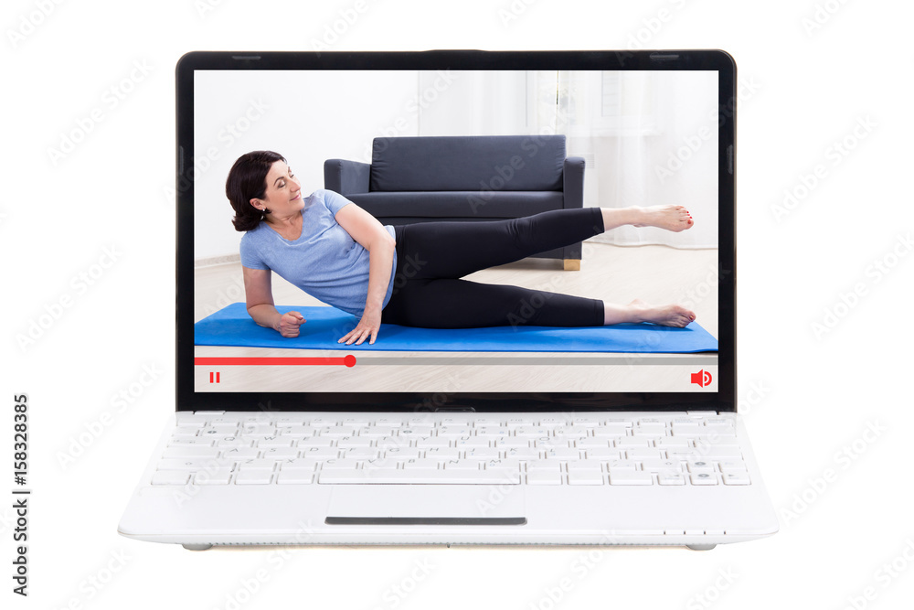 video blog concept - mature woman showing her training online on laptop screen video blog concept - mature woman showing her training online on laptop screen