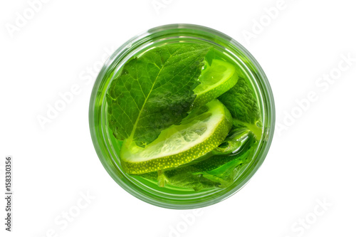 Fresh green drink in a glass with mint. View from above.