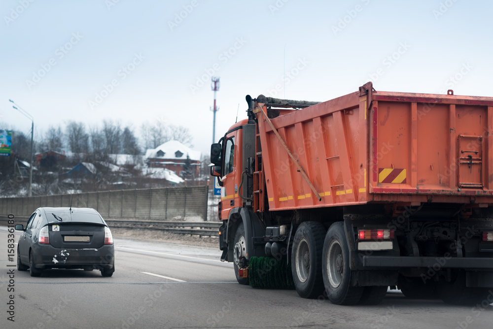 Road cleaning vehicles, A road sweeping vehicle cleans a hightway, car that have machine for cleaning street, Street Sweeper car. Road cleaning vehicles, A road sweeping vehicle cleans a hightway, car that have machine for cleaning street, Street Sweeper car.