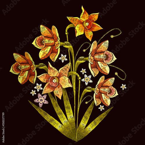 Fototapeta Naklejka Na Ścianę i Meble -  Narcissus embroidery. Beautiful daffodils yellow narcissus embroidery on black background. Template for clothes, textiles, t-shirt design