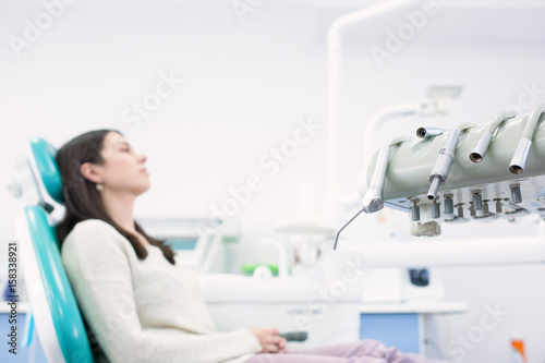 Young female patient in dentist office