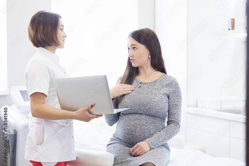 Woman cosmetologist into her procedural beauty parlor in medical clinic Woman cosmetologist into her procedural beauty parlor in medical clinic