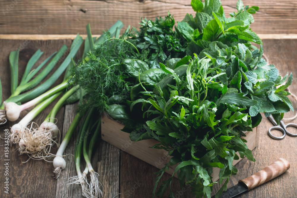 Organic fresh herbs in wooden crate Organic fresh herbs in wooden crate