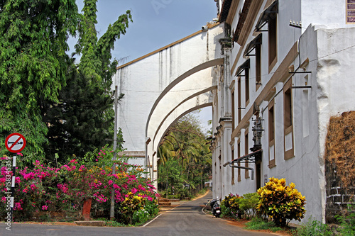 Fototapeta Naklejka Na Ścianę i Meble -  Entrance of Museum of Christian Art in Old Goa, India. The museum, set up in 1994 in the Convent of Santa Monica, exhibits Indo Portuguese religious art, paintings and sculptures.
