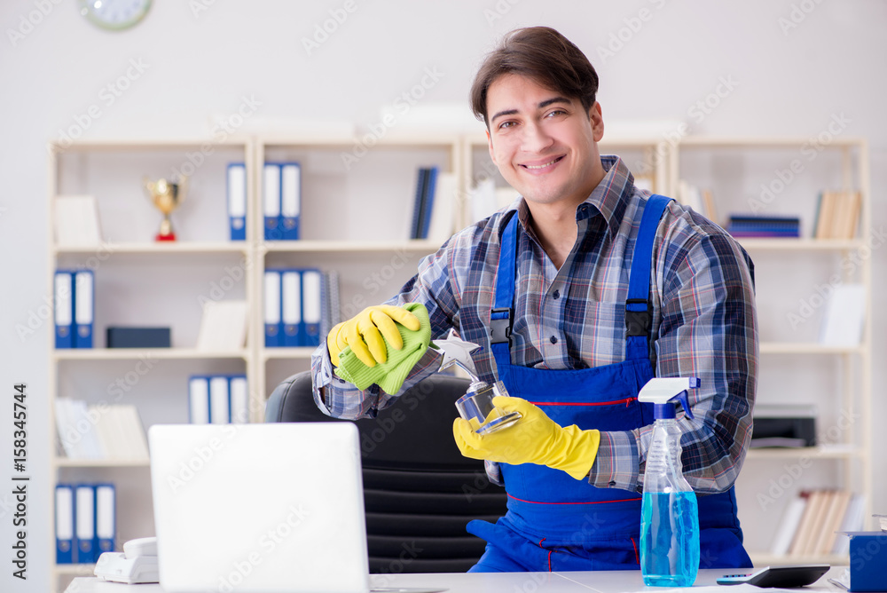Office cleaner working in the office Office cleaner working in the office