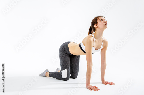 Sports woman on all fours
