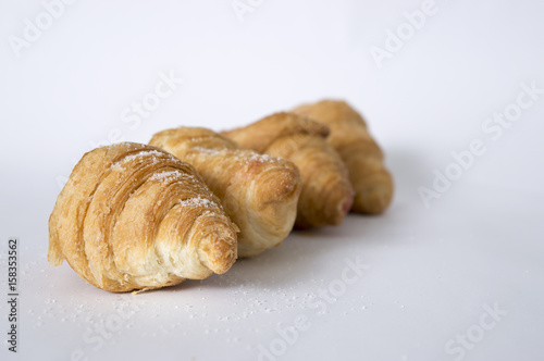 Rossy croissants on a white background photo