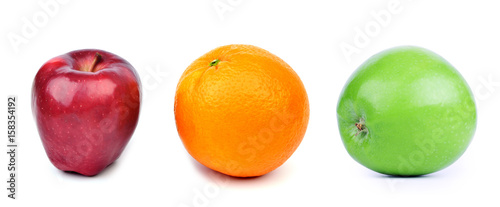 Foto Orange and apples on white background, red, orange and green color