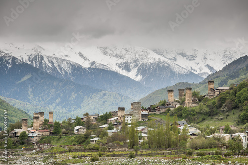 View of the Svanetian towers  in Mestia village against snowy mountains. Upper Svaneti, Georgia. © panifuzja