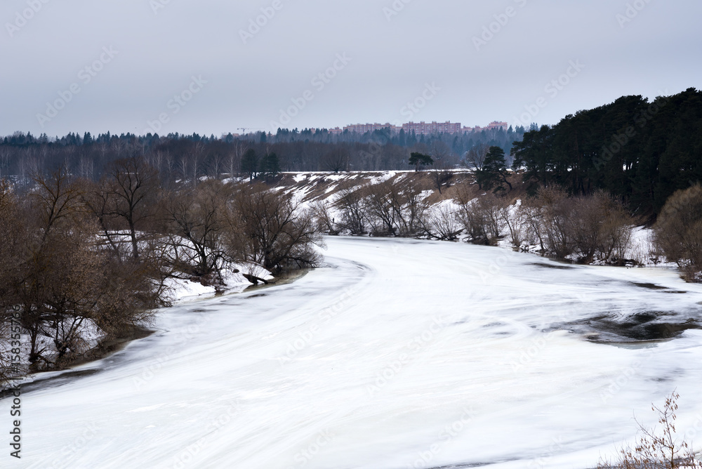 Winter forest landscape - trees covered snow and small river with sunlight, good winter weather, big size Winter forest landscape - trees covered snow and small river with sunlight, good winter weather, big size