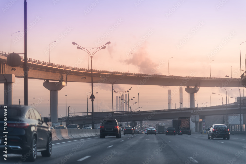Large elevated traffic highway at sunset