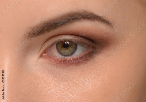 Closeup of beautiful woman eye with makeup