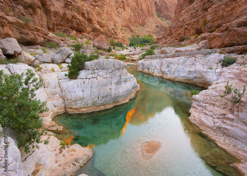 Mountain lake. The beautiful mountain scenery. Wadi Bani Khalid. Oman. photo