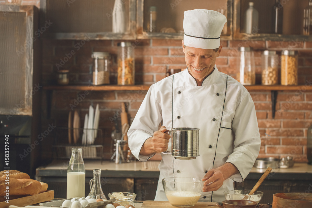 Bakery chef cooking bake in the kitchen professional Bakery chef cooking bake in the kitchen professional