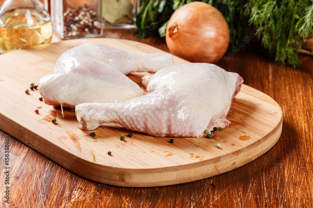 Raw chicken legs and marinade ingredients Raw chicken legs and marinade ingredients