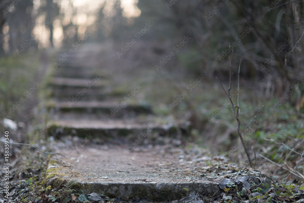 Old damaged stone staircase, up and down, textured background Old damaged stone staircase, up and down, textured background