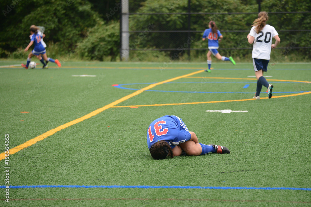 Fototapeta premium Game continues despite injury