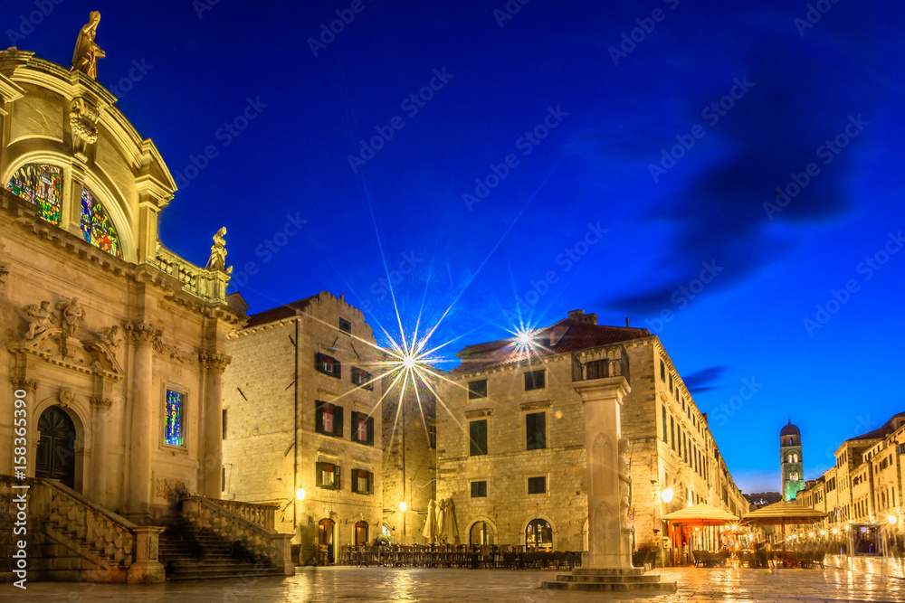 Dubrovnik night scenery. / Night view at cathedral and promenade in town Dubrovnik famous european summer resort in Croatia.