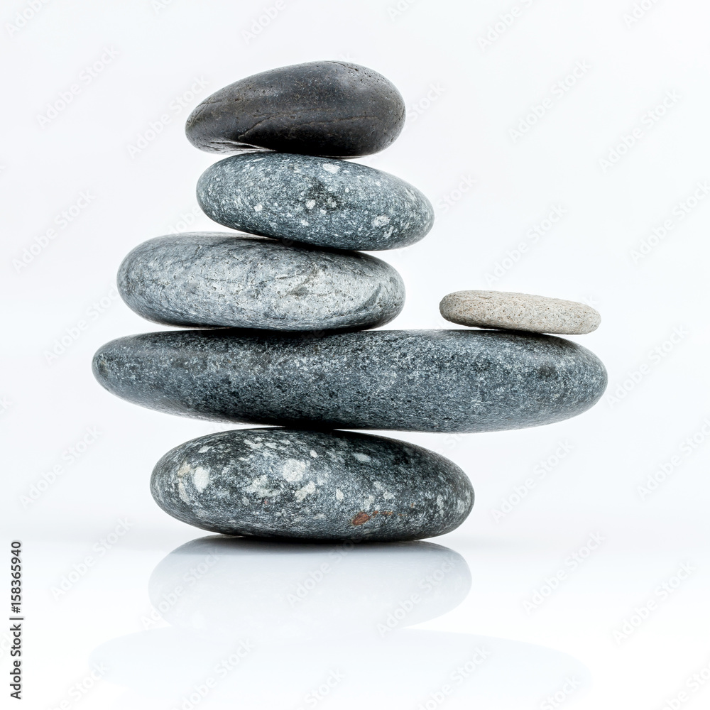 The Stones spa treatment scene on bamboo background and bamboo leaves with raindrop zen like concepts. The Stones spa treatment scene on bamboo background and bamboo leaves with raindrop zen like concepts.