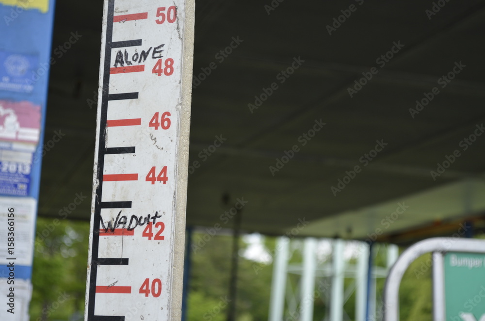 Height restriction chart at amusement park carnival ride Stock Photo