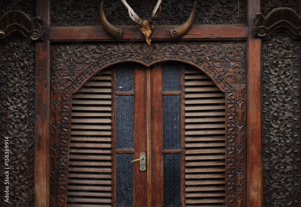 Wood Carving in front of house Wood Carving in front of house