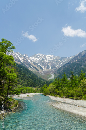 Hotaka mountain range and azusa river in spring at kamikochi national park nagano japan