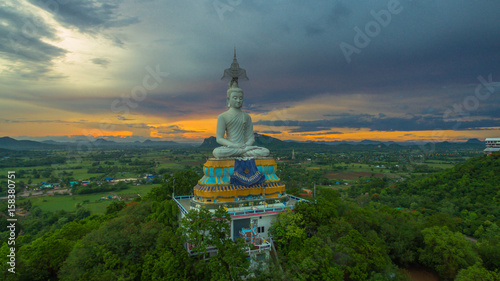 sunset at big Buddha of Wat Nong Hoi © Narong Niemhom