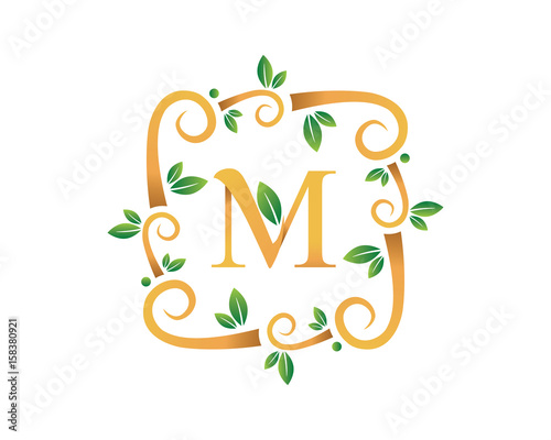 Elegant Floral M Letter With Gold Branch Logo