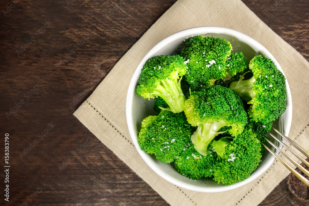 Cooked green broccoli with sea salt and copyspace Cooked green broccoli with sea salt and copyspace