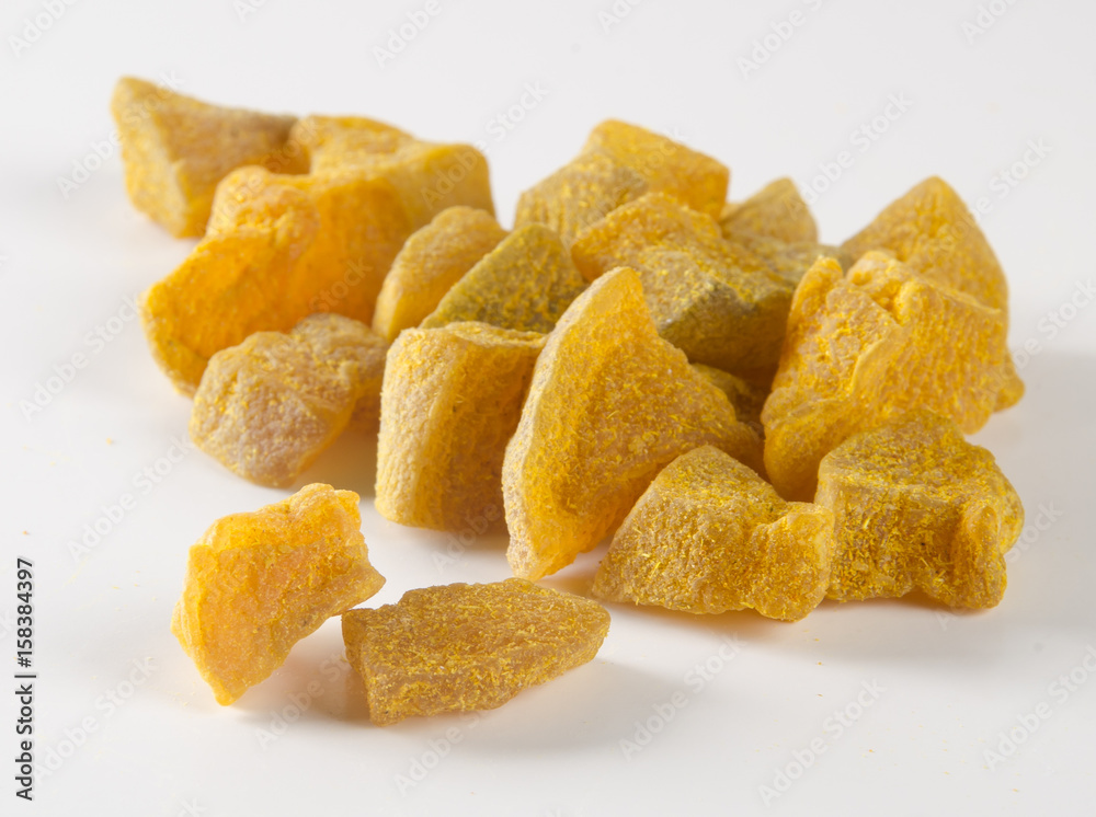 preserved fruits or dry ginger on the background. preserved fruits or dry ginger on the background.