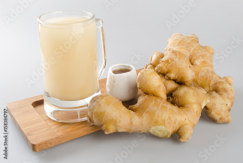 Ginger tea or Ginger tea with haney on background. photo