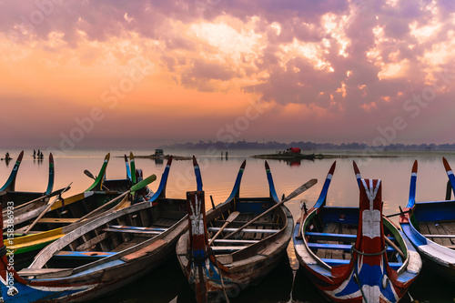 Local Boats and U Bein bridge at Taungthaman Lake in Mandalay  Myanmar.