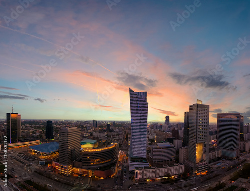 Panorama of Warsaw city with modern skyscraper in sunset time
