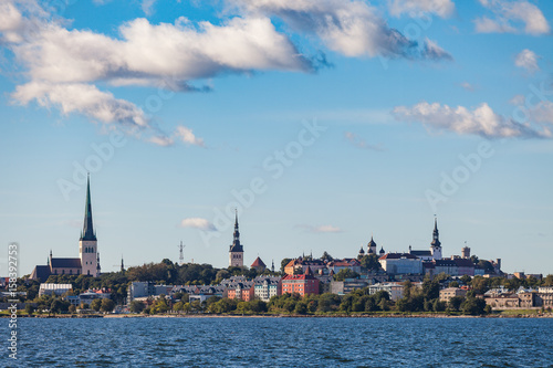 Scenic summer view of the Old Town architecture and sea old harbor in Tallinn, Estonia