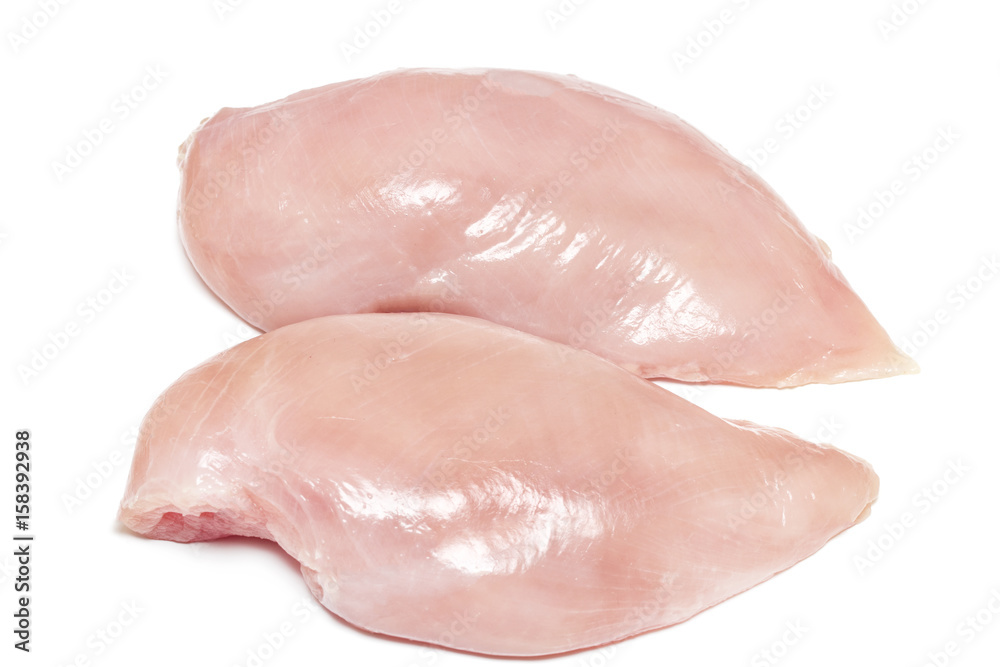 Two fresh raw chicken breasts on white background Two fresh raw chicken breasts on white background