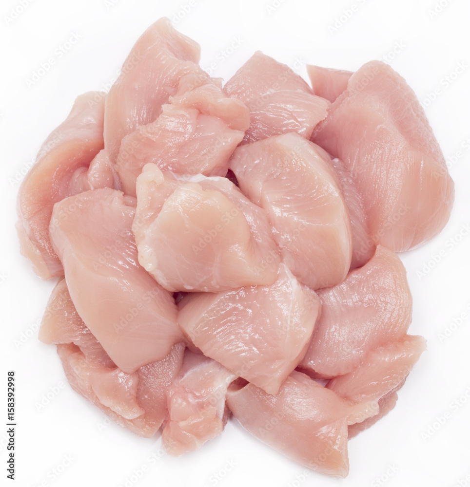 Top view of raw chicken fillet chunks isolated on white Top view of raw chicken fillet chunks isolated on white