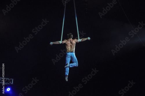 Gymnast under the dome of the circus