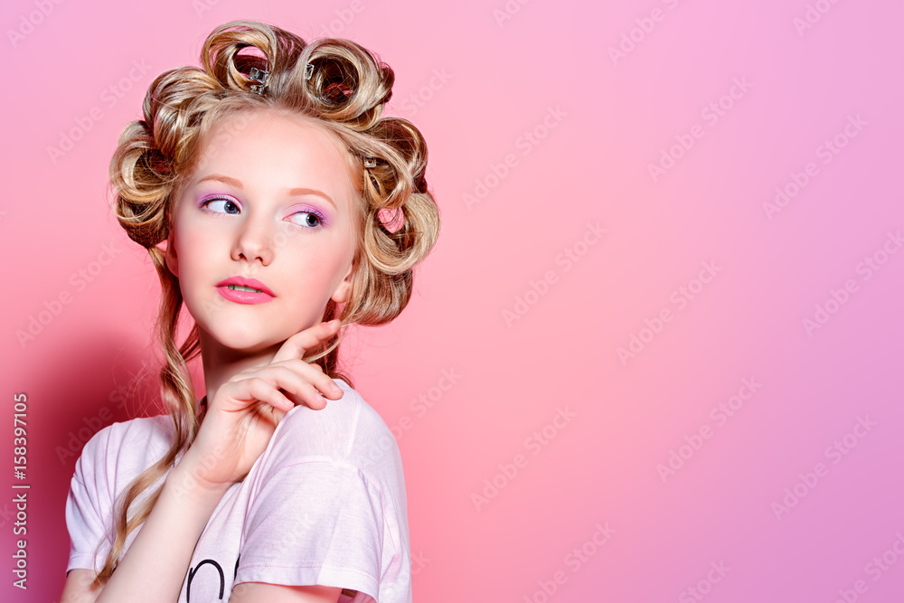 funny teen with curlers