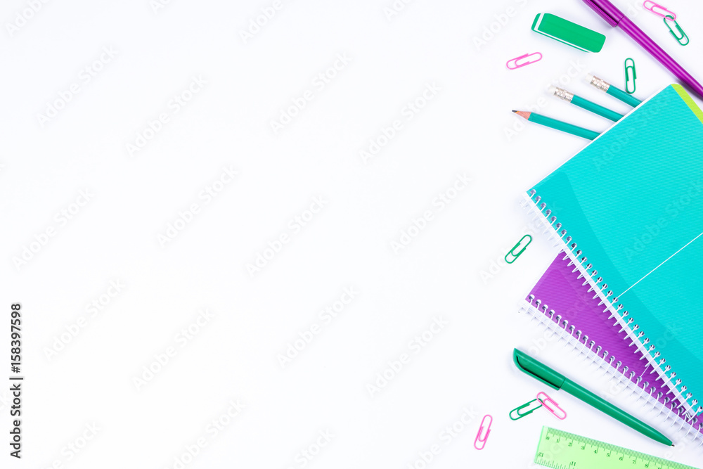 School stationery on white background with copyspace