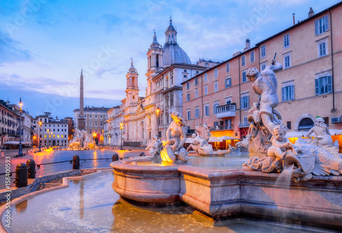 View of Piazza Navona and fountain before sunrise, Rome photo
