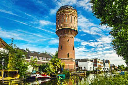 Old brick water tower in ancient European city of Utrecht, Netherlands