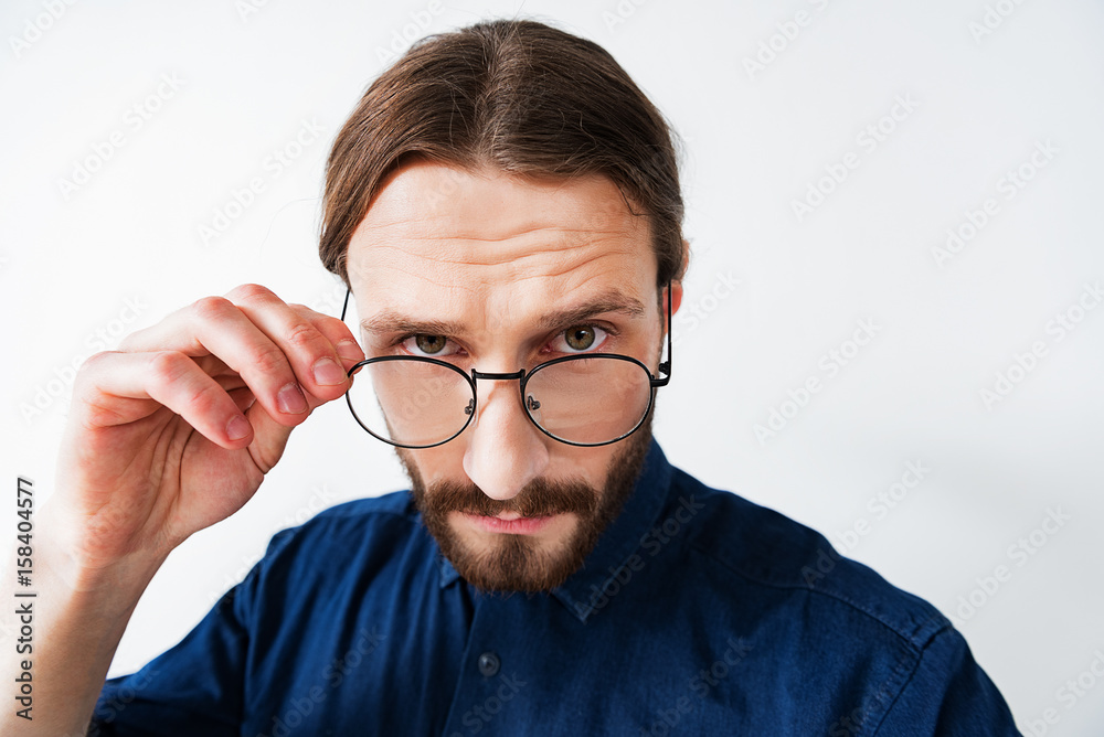 Serious smart guy with eyeglasses Serious smart guy with eyeglasses