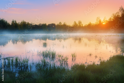 Misty morning on a lake in the spring time