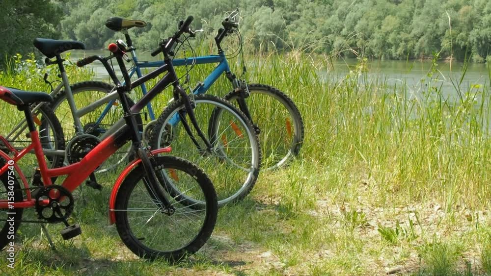 Bicycles family in nature. Three bicycles on vacation. Bicycles family in nature. Three bicycles on vacation.